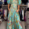 Elizabeth™ | Vestido maxi vaporoso con mangas abullonadas y escote en V