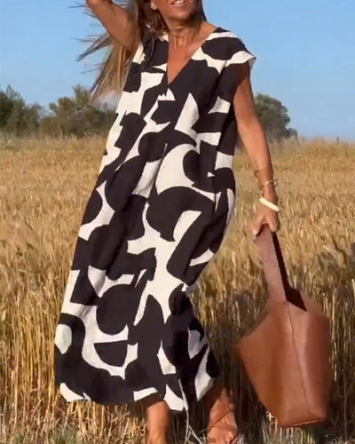 Elena - Vestido sin mangas con estampado geométrico irregular