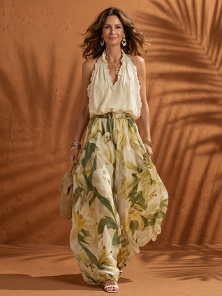 Solange | Conjunto de blusa de cuello halter y pantalón de pierna ancha con estampado floral