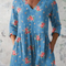 Melanie | Blusa larga con escote en V
