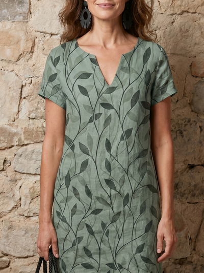 Ainhoa | Vestido hasta la rodilla con estampado de hojas y escote en V