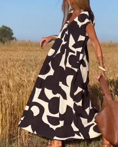 Elena - Vestido sin mangas con estampado geométrico irregular