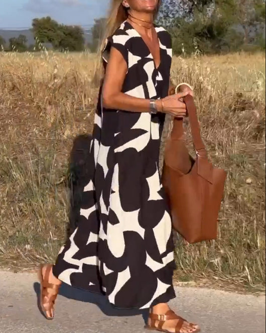Elena - Vestido sin mangas con estampado geométrico irregular