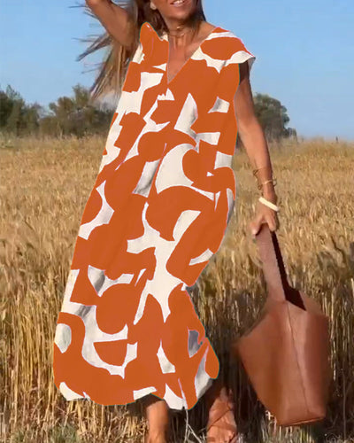 Elena - Vestido sin mangas con estampado geométrico irregular