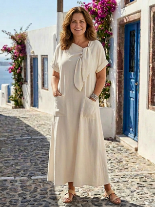 Eloisa | Vestido maxi de cuello redondo, mangas cortas y con un bolsillo